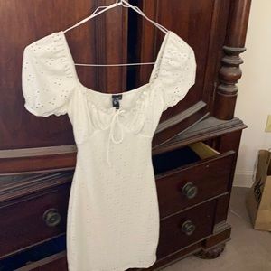 Never worn capped sleeved white fitted dress